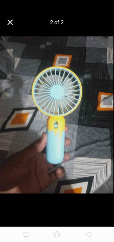 Rechargeaable hand fan. . . . beetry upto 2 hour