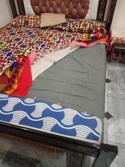 Steel/iron double bed along with new metrice is for sale