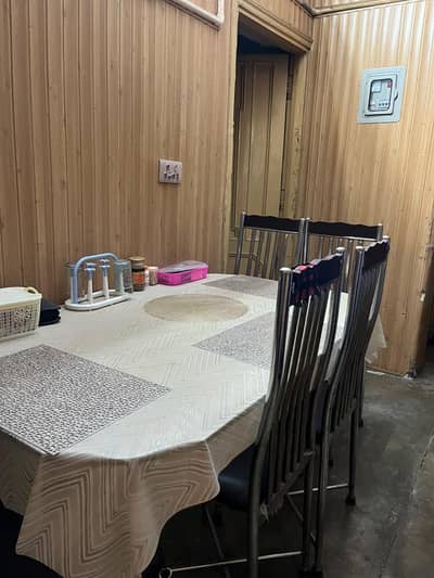 Dining Table with glass top and 6 chairs