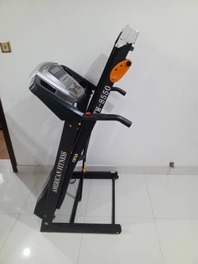 treadmill and small gym equipment