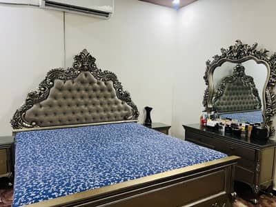 Premium luxury carved bedroom set in excellent condition.