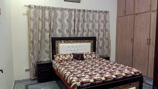 Queen size bed with side tables