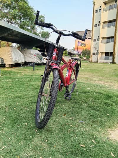 Red Bicycle in Good  Condition with Back Carrier