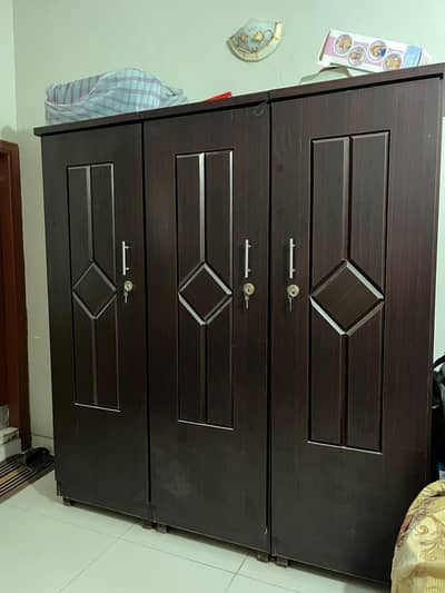 3 door cupboard wood