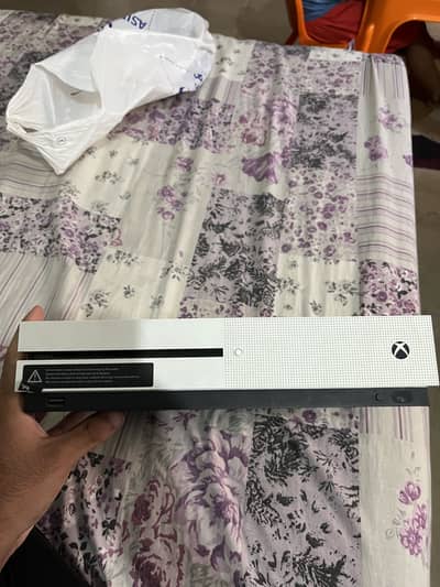 Xbox one S for sale with one controller and 2 games