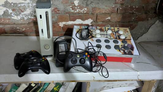 Xbox 360 with 4 controllers 2 wireless one with wire and one arcade s