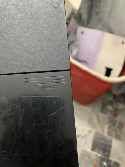 Ps2 slim with one controller and and cables with av cable