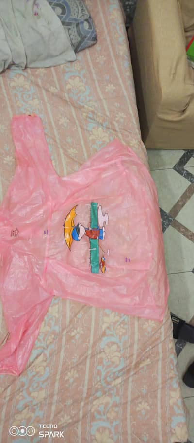 Wuxi Qian Rain coat in pink color for girl