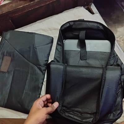 Laptop bag with laptop pouch