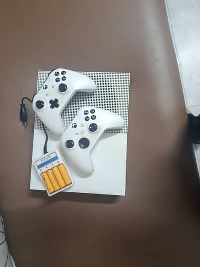 Xbox one s and two controller and games
