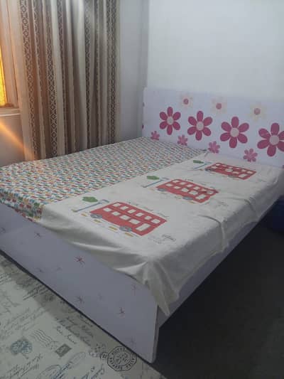 queen size bed with mattress and wordrobe