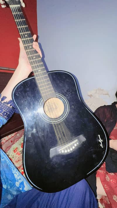 guitar with extra strings and bag  all ok