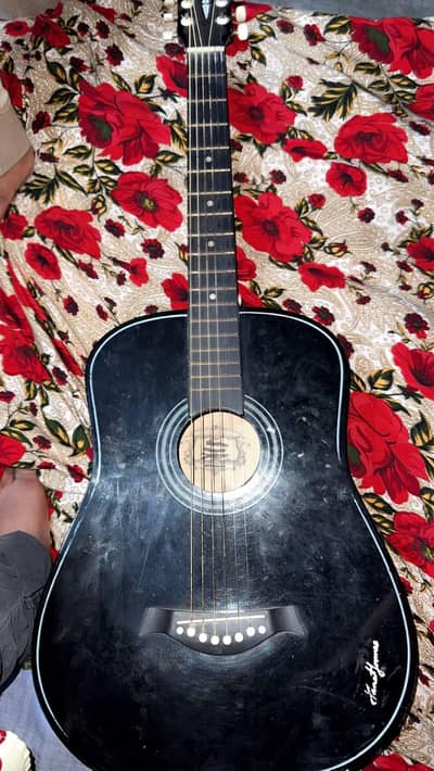 guitar with extra strings and bag  all ok