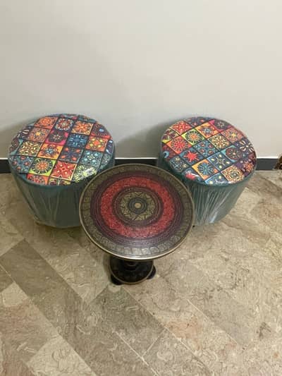 Handcrafted stools with coffee table.