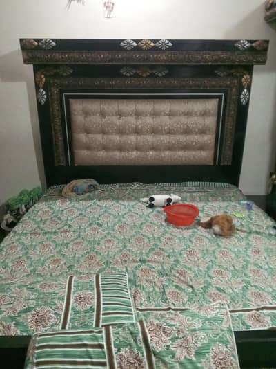 Bed with side tables and dressing table