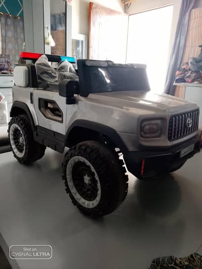 Kids Electric Jeep designed as a Toyota Hummer Police Model.