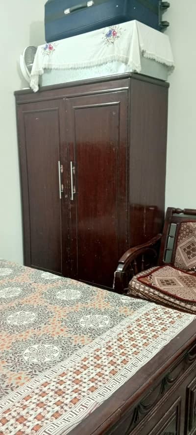 double sided wooden wardrobe with locker. .