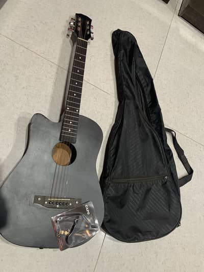 With Bag and Capo 2 month used