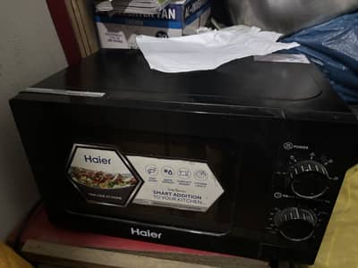 HAIER MICROWAVE IN GREAT CONDITION IN 10499!