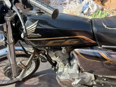 Honda 125 self start black color