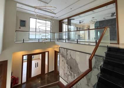 1 Kanal Slightly Used Modern Design House For Rent In DHA Phase 5 Lahore.