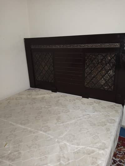 king size bed with side tables and metress and dressing