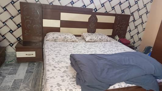 wooden bed set in good condition