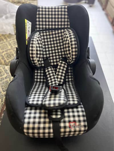 Baby black carrier and car seat