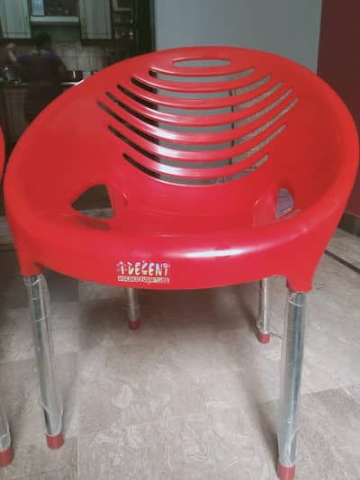 PAIR OF PLASTIC CHAIRS