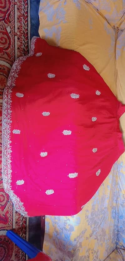 Bridale lehnga is for  one time weared or is in a good condition .