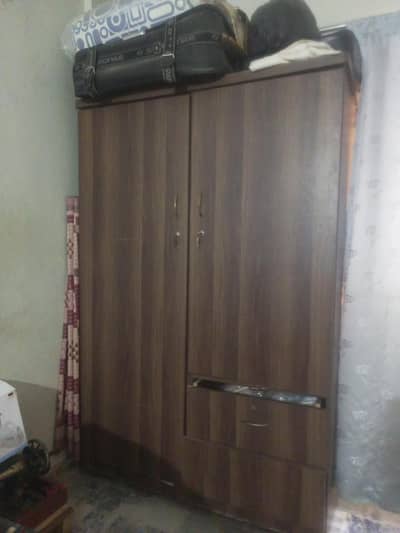 this an wood almari and one cabinet is broken