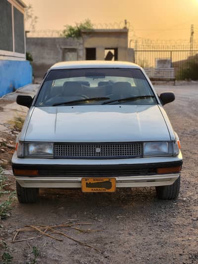Toyota Corolla 1986 (Chilled AC / Petrol/ CNG)