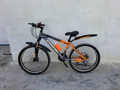 Stoner mountain bike dual disk brakes 21 speed gears 24 inches