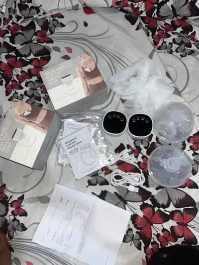 Wearable electric breast pump double