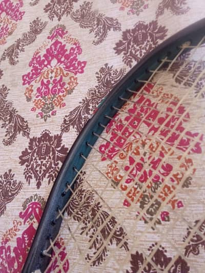 (Prince Extender squash racket)