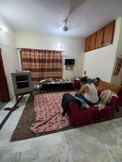 Pak block allama iqbal town 12 marla uper portion lower locked for rent in prime location