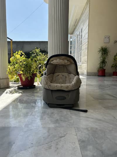 Baby cot cum car seat