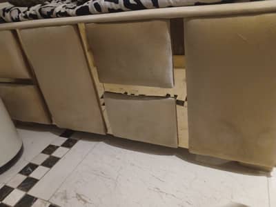 Tow single beds without mattresses.