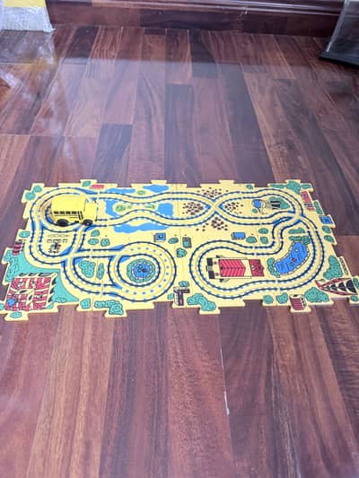 Jigsaw puzzle and car track