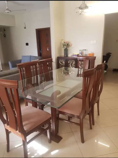 Dinning table with 6 elegant chairs, 2 seater sofa and Center table