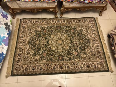 Premium green Persian style carpet, neat and well cept