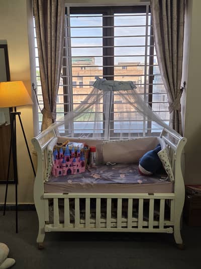 White Baby Cot on Wheels