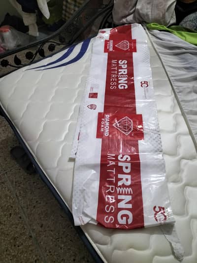 ALMOST NEW DIAMOND SPRING MATRESS