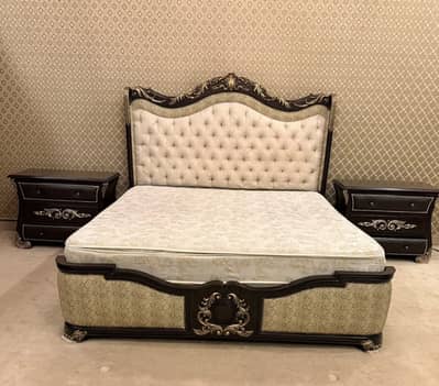 Wooden bed with leather