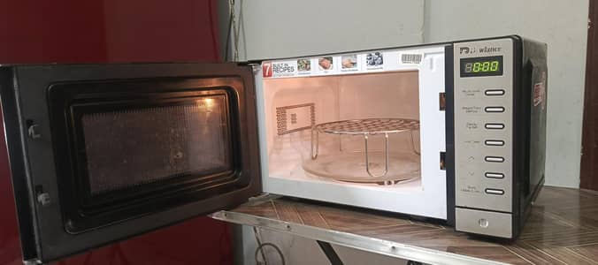 Dawlance 2 in 1 microwave grill oven neat and clean condition