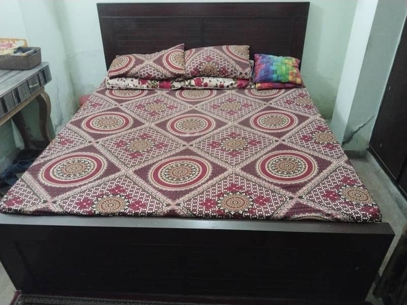 king size bed and two side table 0