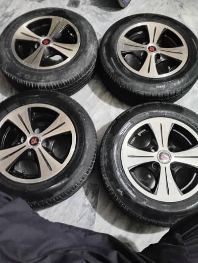 Brand new alloy rims with new tyres 13 inch