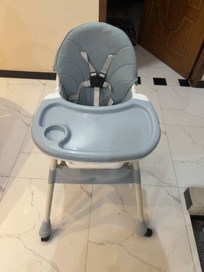 Baby high chair with swing