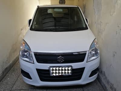 suzuki wagon r low milage. showroom condition