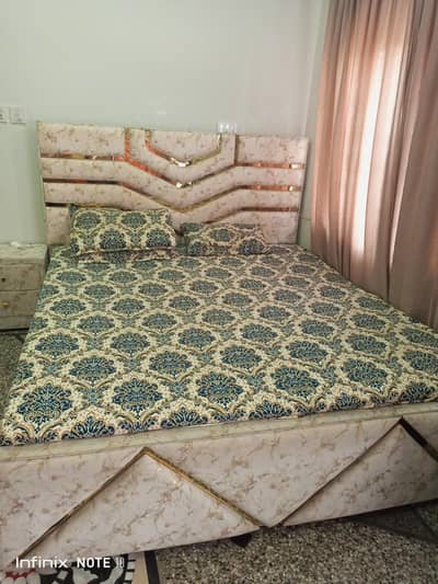 Double bed with spring matress + side tables